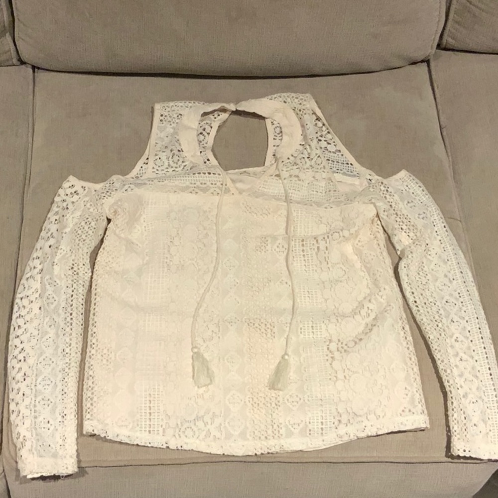 White designed blouse shoulder showing